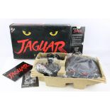 Atari Jaguar multimedia System - Boxed with Games. This lot contains a boxed Atari Jaguar.