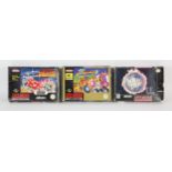 An assortment of 3 boxed SNES games (PAL) Includes: Super Smash TV, Super Bomberman 2 and NBA Jam