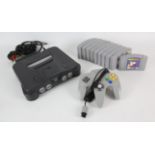 Nintendo N64 console with original controler (grey), power adapter, RF output cable,