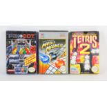 An assortment of 3 boxed NES games (PAL) Includes: Pin Bot, Marble Madness and Tetris 2