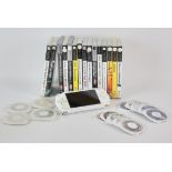 PLAYSTATION PSP Console (White) An assortment of PSP Games + 1 UMD Movie (PAL) Includes: 15 boxed