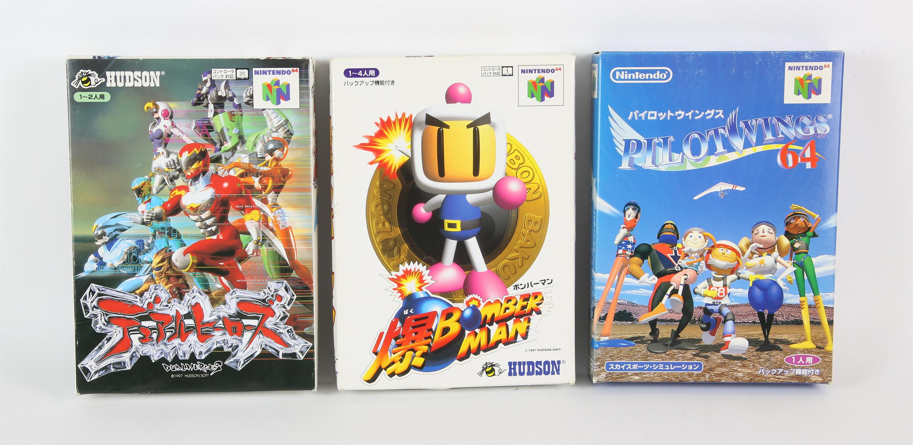 An assortment of 3 boxed N64 games (NTSC-J) Includes: Pilotwings 64, Bomberman and Dual Heroes