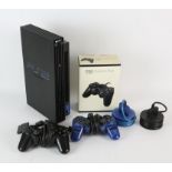 Sony PlayStation 2 Console. This lot contains a Sony PS2, two Controllers, one boxed,