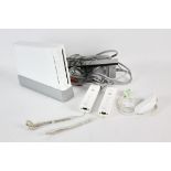 NINTENDO Wii Console + accessories Accessories include: Nunchuk (x1) and Wii Remote (x2)