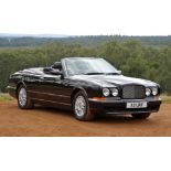 1998 Bentley Azure convertible. Private registration number A3 URR. Genuine low mileage having cover