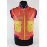 James Brown - a Mike Bain orange leather sleeveless vest, with yellow pockets and rainbow coloured