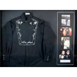 Michael Jackson - A black western shirt with white bib pattern on the front owned and worn by