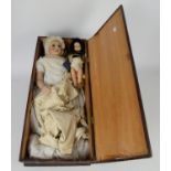 Antique wax doll 64cm and a smaller plastic doll, 30cm, contained in a pine box, the lid with an