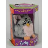 Furby model 70-800 grey and pink, boxed with instructions and tags, and a Grandstand Astrowars