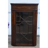 Edwardian corner cabinet, inlaid with swags and floral motifs, with glazed door enclosing shelves,