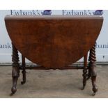 Victoria walnut twin flap table, on twist supports, with foliate carved legs, and gate leg supports,