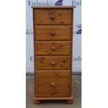 Pine chest of drawers with five drawers, H103 x W43.5 x D43cms, together with a pine bookcase with