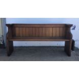 Oak church pew with hinged shelf to the left side, 20th century, H86 x W177 x D51