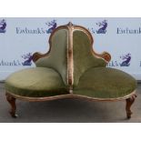 Late Victorian conversational settee with walnut show frame approx. 130cm dia.