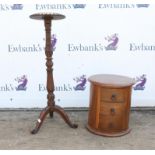 A cylinder drum chest, with three drawers, 42cm high x 38cm diameter, and an ornately carved