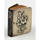 Art Nouveau Lily decorated silver fronted common prayer book by William Coymns London 1904