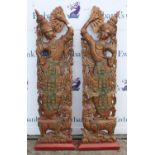 Pair of carved and painted figures of Thai dancers standing on mythical creatures, 155cn H