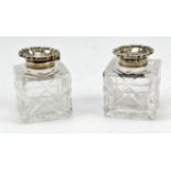 Silver topped glass ink wells, various makers, 6.5cm high (2)