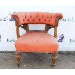 Edwardian walnut armchair, with buttoned curving back, above padded seat, turned lobed legs,