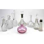 Silver topped small claret jug and a selection of other decanters