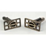 Pair of pierced silver cufflinks marked KH97 with sliver marks.