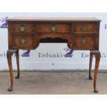 Burr walnut dressing table, in the George I style, 20th Century, with five drawers,