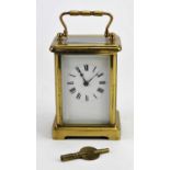 French brass carriage timepiece, the white enamel dial with Roman numerals, H 15cm