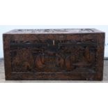 Chinese camphorwood chest, 20th Century, overall carved with figures in landscapes,