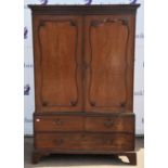 A Mahogany Linen press, two doors opening to reveal linen press slides, above two short drawers