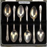 Cased set of floral embossed silver spoon, Birmingham, 1960