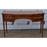 Reproduction yew wood bow front sideboard, 20th century, four short and one long drawer on tapering