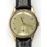 Omega, A gentleman's gold wristwatch, the signed dial with Arabic and dagger hour markers,