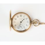 Waltham A Gold half hunter pocket watch the signed white enamel dial with Roman numeral hour