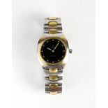 Omega A gentleman's bi metal wristwatch the signed black dial with bead hour markers,