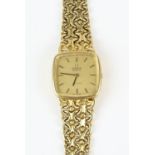 Omega a Ladies reference 591.0023 De Ville Gold wristwatch, the signed champagne dial with baton