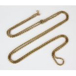 A long guard chain, fancy link chain with a clasp on one end, with a sliding length adjuster,