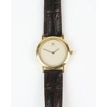 Omega a Ladies De Ville wristwatch the signed circular dal within a gold plated case,