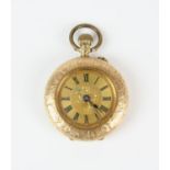 A gold pocket watch 30.5mm case, featuring a gold dial with engraved floral detail and Roman