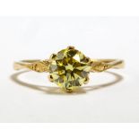 Fancy yellow diamond single stone ring, 1.63 carats round brilliant cut, claw set with six prongs