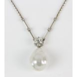 Pearl and diamond necklace, white baroque pearl, suspended from an old cut diamond weighing an