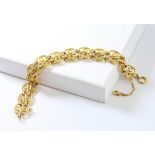 Fancy link yellow gold bracelet, with bolt ring clasp and safety chain, stamped 18 ct,