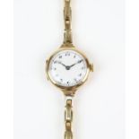 AMENDED DESCRIPTION 9CT GOLD CASE Buren, a gold wristwatch, the unsigned white enamel dial with