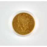 A US $20 gold double eagle coin, dated 1900 from the San Francisco mint, in a capsule, weighing 33.