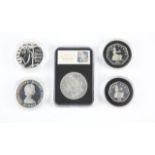 A small group of coins, comprising a British £5 silver proof 2017 (King Canute) in its case with
