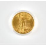 A US $20 gold double eagle coin, dated 1915 from the San Francisco mint, in a capsule, weighing 33.