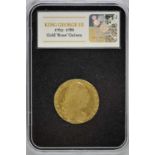 A gold guinea 1779, about fine, in a modern case and with a certificate.