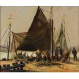 Louis Montaigu (French 1905-1988). Fishermen working at their boats on a beach, oil on canvas laid