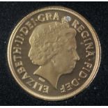 UPDATED DESCRIPTION A gold proof full sovereign 2012, distinguished by a diamond insert for the