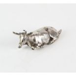 Novelty silver box in the form of a recumbent cow with hinged cover to the base import marks for