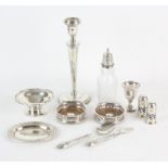 Silver candle stick with weighted base, pedestal bon-bon dish, small oval dish, pedestal cup,